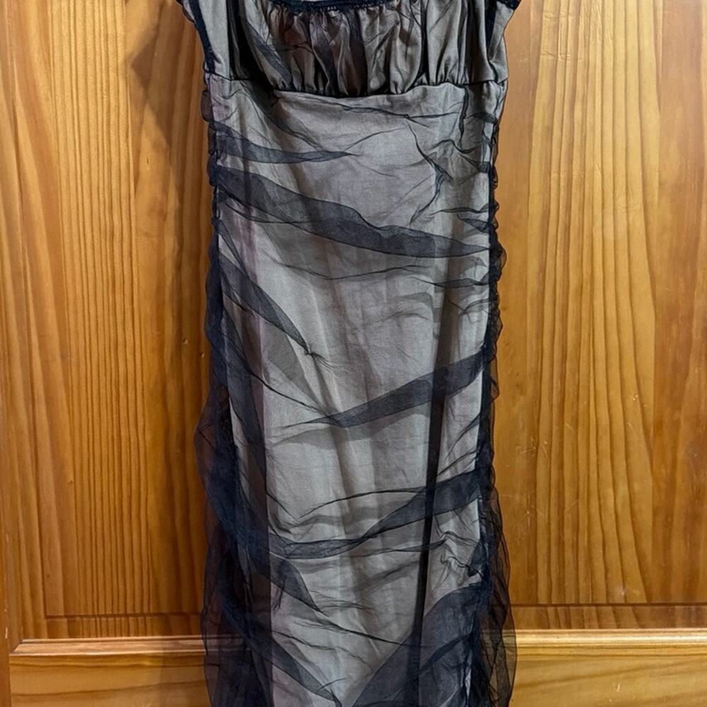 Generation Kiss Form Fitting tan dress with black mesh overlay Size Small